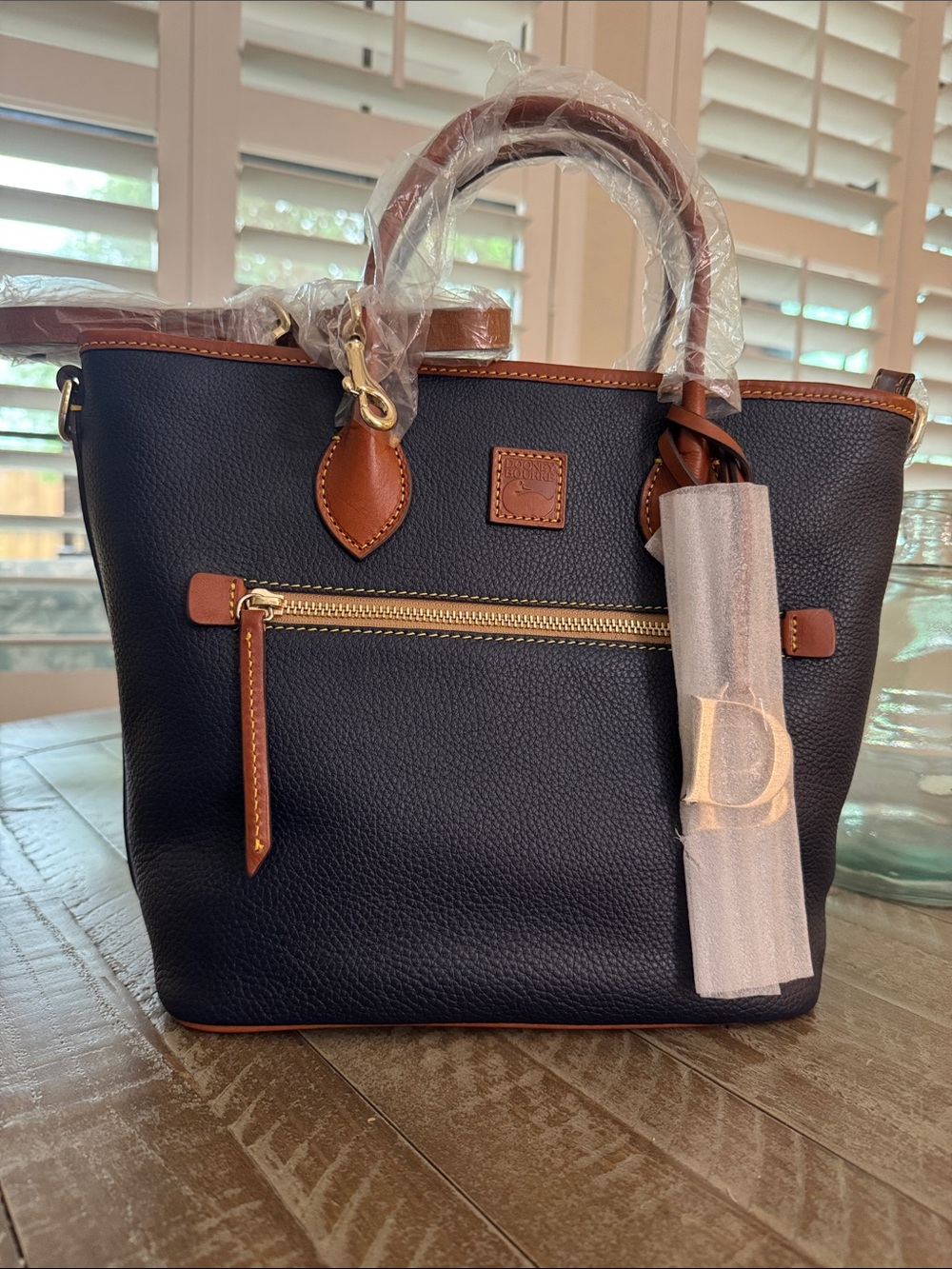 NWT, Dooney & Bourke midnight blue  pebbled leather tote bag.